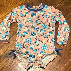 Ruffle Butts Peach and Blue Floral Long-Sleeve bathing suit